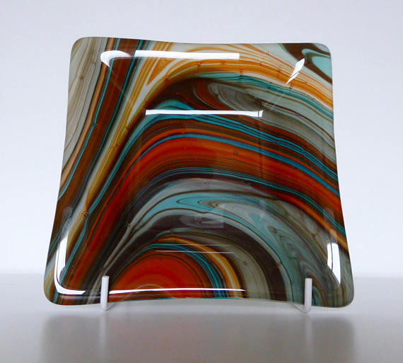 Fused glass dish and orange-turquoise swirls